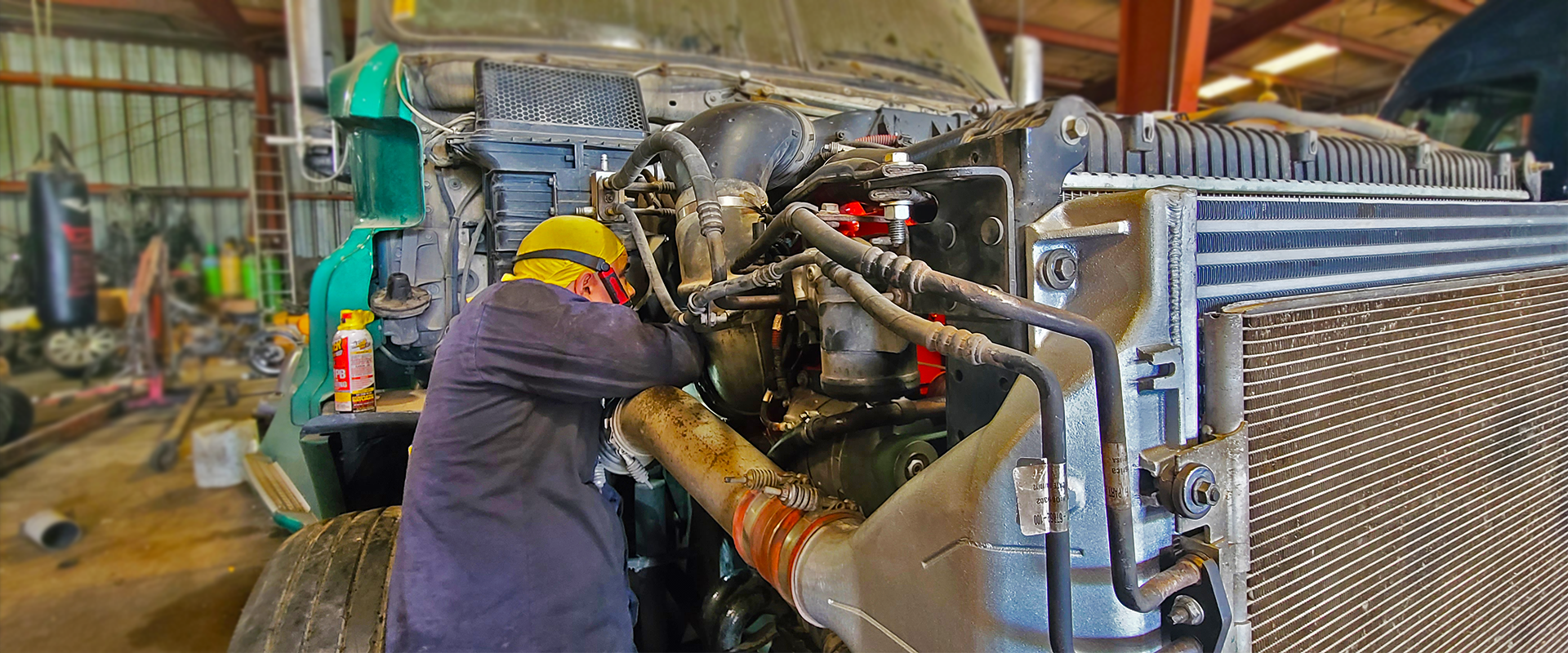 Salazar Semi-Truck Repair shop in Dallas TX servicing head gasket and oil cooler with coolant-in-oil contamination