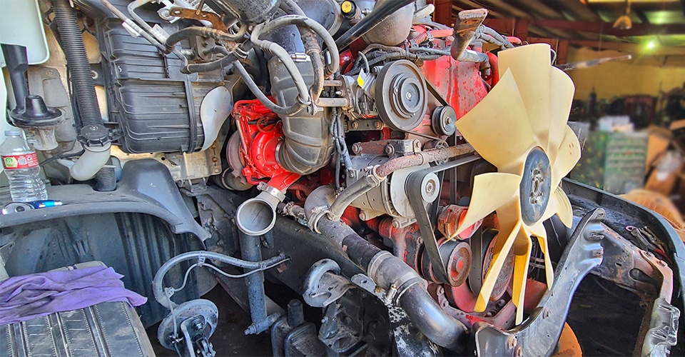 Salazar Semi-Truck Repair shop in Dallas TX diagnosing white smoke from semi-truck exhaust