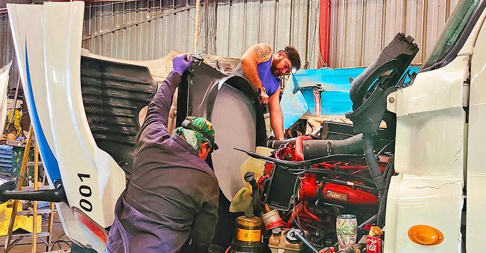 Semi-truck cooling system diagnosis for overheating under load at a Dallas TX heavy-duty shop
